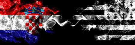 Croatia, Croatian vs Brittany, Bretagne, Bretons smoky mystic flags placed side by side. Thick colored silky abstract smoke flags.の写真素材
