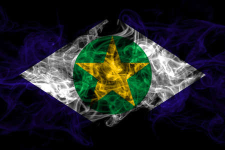 Brazil, Brazilian, Mato Grosso smoke flag isolated on black backgroundの写真素材
