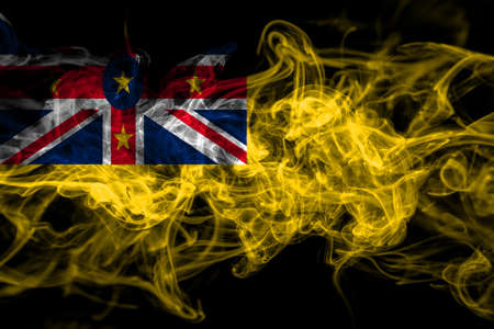New Zealand, Niue smoke flag isolated on black backgroundの写真素材
