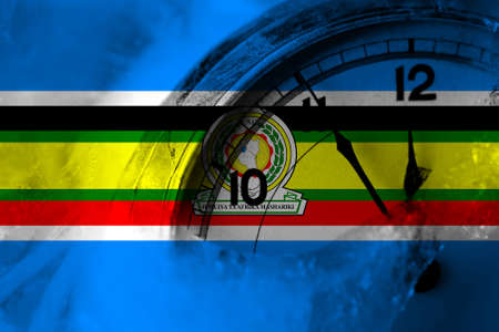 East African Community flag with clock close to midnight in the background. Happy New Year conceptの写真素材