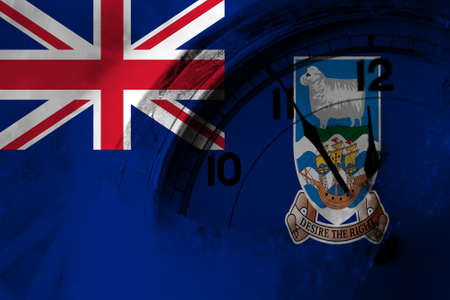 British, Britain, Falkland Islands flag with clock close to midnight in the background. Happy New Year conceptの写真素材