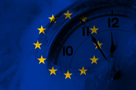 Europe, European, European Union flag with clock close to midnight in the background. Happy New Year...
