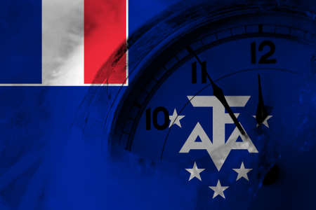 France, French Southern and Antarctic Lands flag with clock close to midnight in the background. Happy New Year conceptの写真素材
