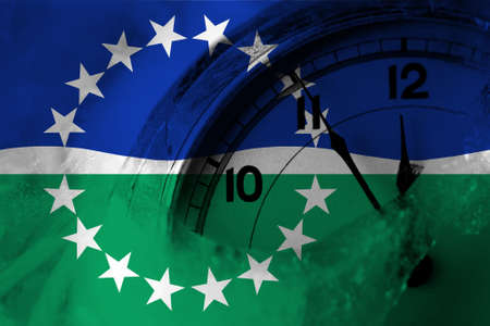 United States of America, America, US, USA, American, Hampton Roads, Virginia flag with clock close to midnight in the background. Happy New Year conceptの写真素材