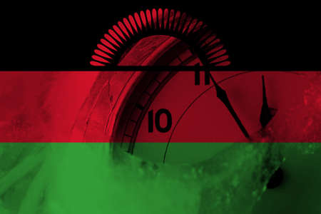 Malawi flag with clock close to midnight in the background. Happy New Year conceptの写真素材