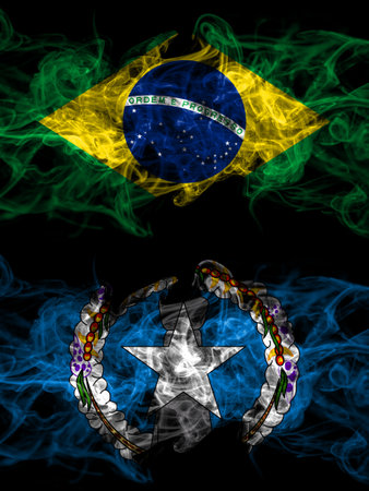 Brazil, Brazilian vs United States of America, America, US, USA, American, Northern Mariana Islands smoky mystic flags placed side by side. Thick colored silky abstract smoke flags.の写真素材