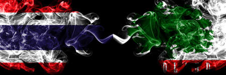 Thailand, Thai vs United States of America, America, US, USA, American, Woodland, California smoky mystic flags placed side by side. Thick colored silky abstract smokes flags.の写真素材