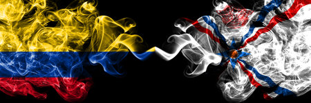 Colombia, Colombian vs Assyria smoky mystic flags placed side by side. Thick colored silky abstract smokes flags.の写真素材