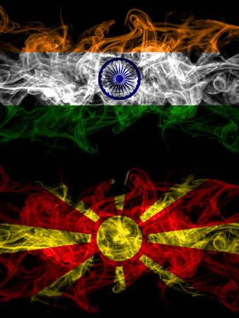 India, Indian vs Macedonia, Macedonian smoky mystic flags placed side by side. Thick colored silky abstract smoke flags.の写真素材