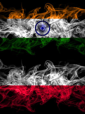India, Indian vs Poland, Polish, Pole smoky mystic flags placed side by side. Thick colored silky abstract smoke flags.の写真素材