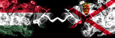 Hungary, Hungarian vs United Kingdom, Great Britain, British, Jersey smoky flags side by side.の写真素材