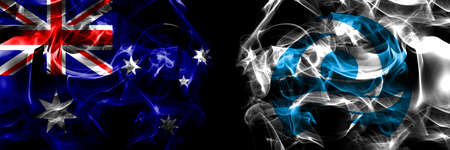 Flags of Australia, Australian vs Japan, Japanese, Yakumo, Hokkaido, Oshima, Subprefecture. Smoke flag placed side by side on black background.の写真素材