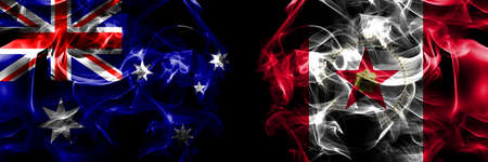 Flags of Australia, Australian vs United States of America, America, US, USA, American, Birmingham, Alabama. Smoke flag placed side by side on black background.の写真素材