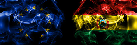 Flags of EU, European Union vs Bolivia, Bolivian. Smoke flag placed side by side on black background.の写真素材