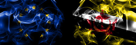 Flags of EU, European Union vs Brunei, Bruneian. Smoke flag placed side by side on black background.の写真素材