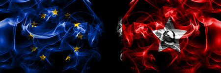 Flags of EU, European Union vs Chinese Workers and Peasants Red Army. Smoke flag placed side by side on black background.の写真素材