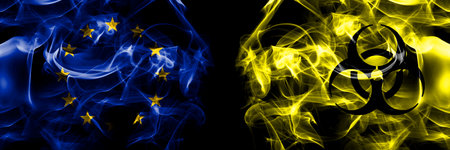 Flags of EU, European Union vs Biohazard, virus, covid19. Smoke flag placed side by side on black background.の写真素材