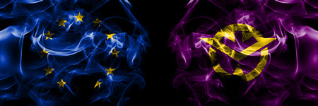 Flags of EU, European Union vs Japan, Japanese, Okayama Prefecture. Smoke flag placed side by side on black background.の写真素材