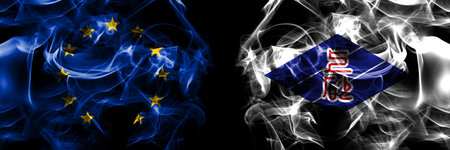 Flags of EU, European Union vs Japan, Japanese, Kamisunagawa, Hokkaido, Sorachi, Subprefecture. Smoke flag placed side by side on black background.の写真素材