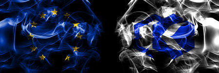 Flags of EU, European Union vs Japan, Japanese, Kutchan, Hokkaido, Shiribeshi, Subprefecture. Smoke flag placed side by side on black background.の写真素材