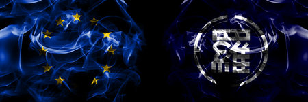 Flags of EU, European Union vs Japan, Japanese, Rausu, Hokkaido, Nemuro, Subprefecture. Smoke flag placed side by side on black background.の写真素材