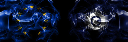 Flags of EU, European Union vs Japan, Japanese, Yubari, Hokkaido, Sorachi, Subprefecture. Smoke flag placed side by side on black background.の写真素材