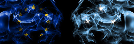 Flags of EU, European Union vs Micronesia, Micronesian. Smoke flag placed side by side on black background.の写真素材