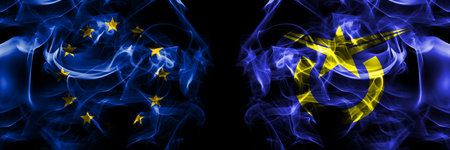 Flags of EU, European Union vs Japan, Japanese, Akabira,  Hokkaido, Sorachi, Subprefecture. Smoke flag placed side by side on black background.の写真素材