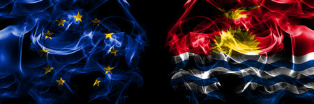 Flags of EU, European Union vs Kiribati. Smoke flag placed side by side on black background.の写真素材