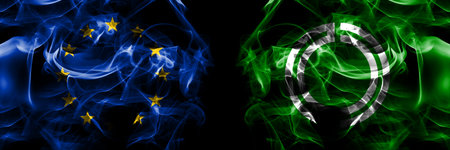 Flags of EU, European Union vs Japan, Japanese, Rikubetsu, Hokkaido, Tokachi, Subprefecture. Smoke flag placed side by side on black background.の写真素材