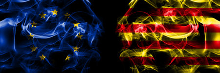 Flags of EU, European Union vs Spain, Catalonia, Senyera. Smoke flag placed side by side on black background.の写真素材
