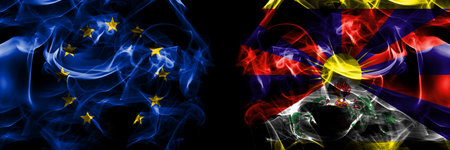 Flags of EU, European Union vs Tibet, Tibetan. Smoke flag placed side by side on black background.の写真素材