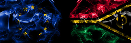 Flags of EU, European Union vs Vanuatu. Smoke flag placed side by side on black background.の写真素材