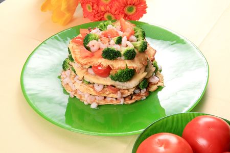 Tortilla with vegetables and shrimpsの写真素材