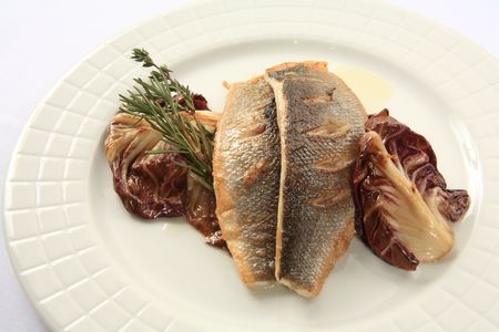 Baked stuffed salmon and lettuceの写真素材