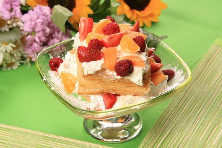 Fruit salad with whipped cream の写真素材