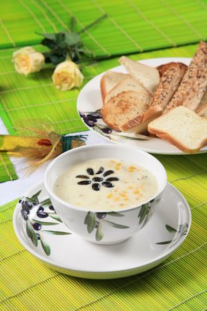 Cream soup with corn and olives 3の写真素材