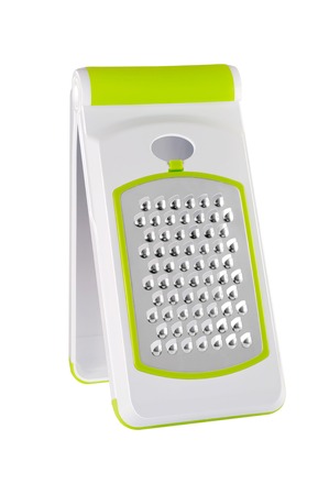 Modern kitchen grater on a white の写真素材