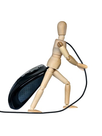 Wooden mannequin on a white background drags a computer mouseの写真素材