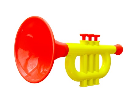 Baby reedpipe made of colored plastic on white backgroundの写真素材