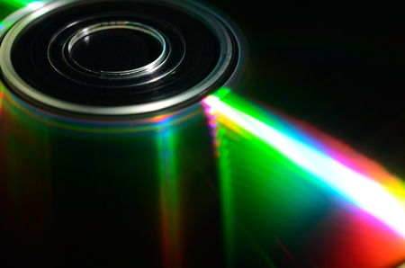 Iridescent reflections on the surface of the laser disk. Close up view.の写真素材