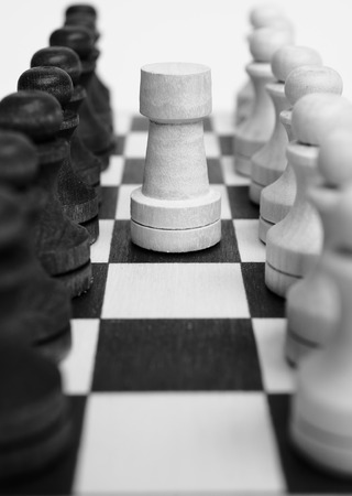 Troop pawns on a chessboard.の写真素材