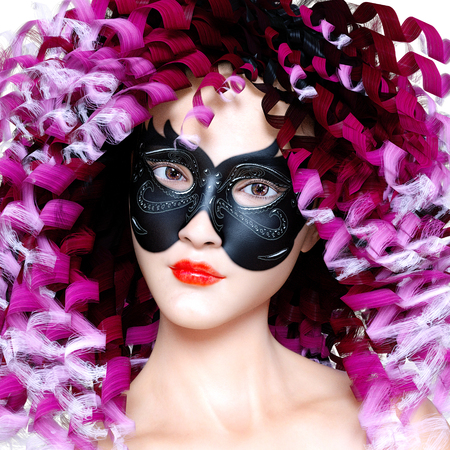3D woman portrait in mask and bright makeup. Long curly hair. Carnival. Conceptual fashion art. Photorealistic render illustration.の写真素材
