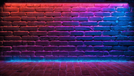 An empty brick wall is illuminated by neon lights with a gradient from pink to blue, creating a colorful and moody backdrop.の素材