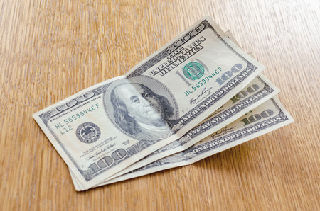 three hundred dollars on the tableの写真素材