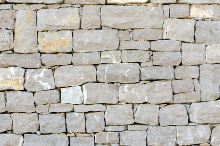 gray stone square shape facade textureの写真素材