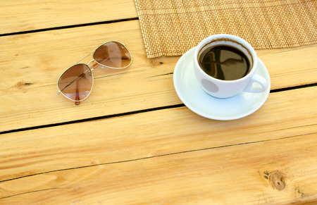 cup of coffee, glasses, water on table, relax time with empty space on tableの写真素材