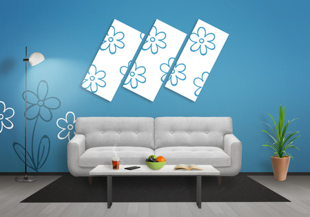 Flowers on art canvas in living room. Blue wall with flower wallpaper and gray wooden floor. Sofa, table, lamp and plant in room.の写真素材