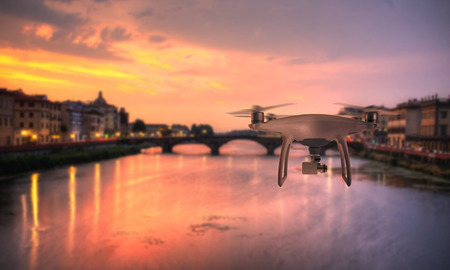 Drone quad copter photographs and records Florence bridge.の写真素材