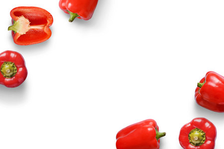 Red peppers on white background with free space in the middle for text or logo promotion.の写真素材